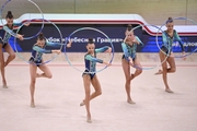 Gymnasts during an exercise with hoops