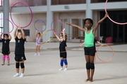 Gymnast Nkenko Sita Davina Chanselvi from the Republic of Congo and young Academy students during the training session