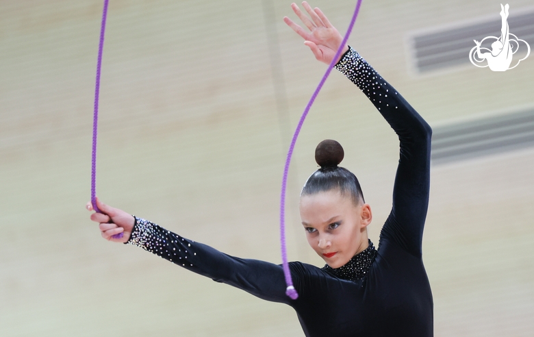 Gymnast during an exercise with a jump rope