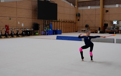Perfecting the clubs routine with Alina Kabaeva