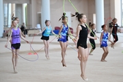 Gymnasts from the Amur Tiger society during an exercise with a jump rope