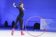 Lamia Tariq Malallah during an exercise with a hoop at floor testing