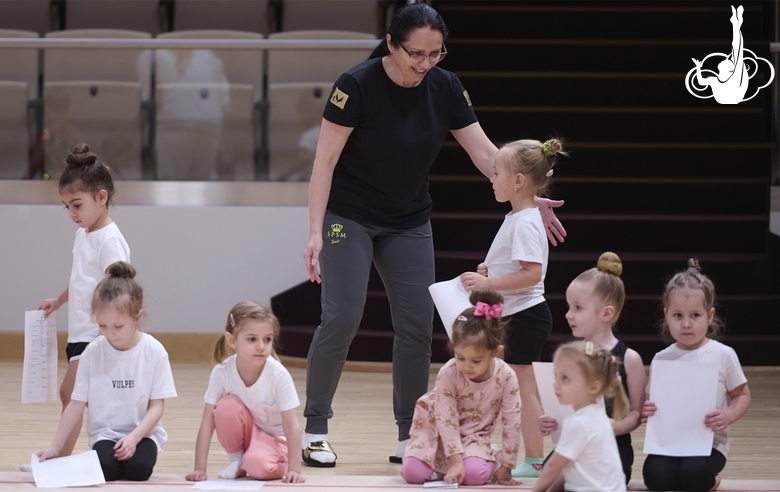 Academy Coach Alla Mishenina with young gymnasts during the selection