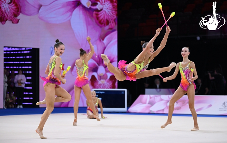 Group team gymnasts from the Omsk region during their clubs routine