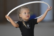 Young gymnast during training