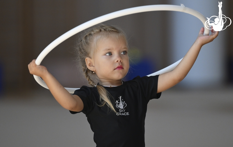 Young gymnast during training