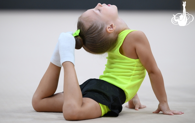 Young gymnast during training