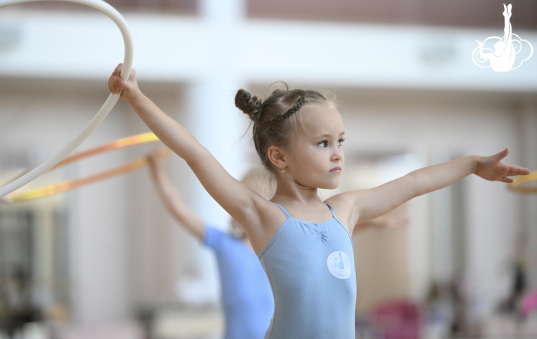 Young gymnast during training