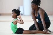 Gymnast from the Republic of Congo Nkenko Sita Davina Chanselvi together with coach Dominique Adama when stretching