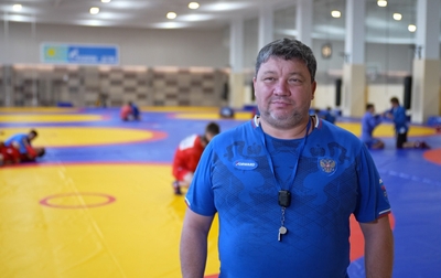 What are the Russian youth sambo team athletes working on at the training camp at the Martial Arts Academy?