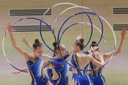 Gymnasts during an exercise with hoops