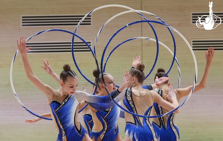 Gymnasts during an exercise with hoops