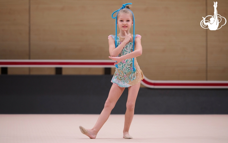 Young gymnast during the workout