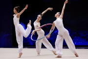 Gymnasts during an exercise with hoops