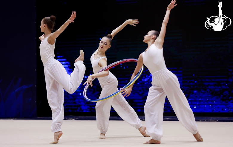 Gymnasts during an exercise with hoops