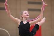 Gymnast during an exercise with a hoop during floor testing