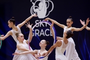 Gymnasts during an exercise with hoops