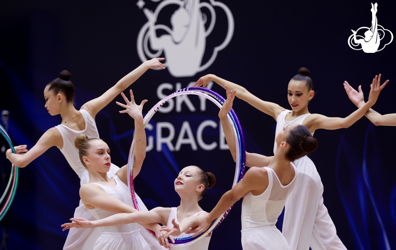 Gymnasts during an exercise with hoops