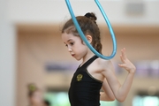 Gymnast during an exercise with a hoop at training