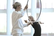 Academy coach Anna Ustsova works with Elvira Belyaeva