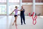 Group team gymnasts during a class with the honored coach of Russia Veronika Shatkova