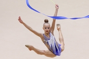 Gymnast during exercise with ribbon