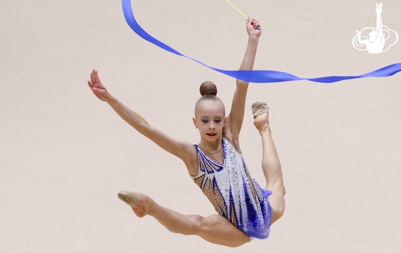 Gymnast during exercise with ribbon