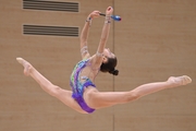 Karolina Tarasova during an exercise with clubs at a control training session