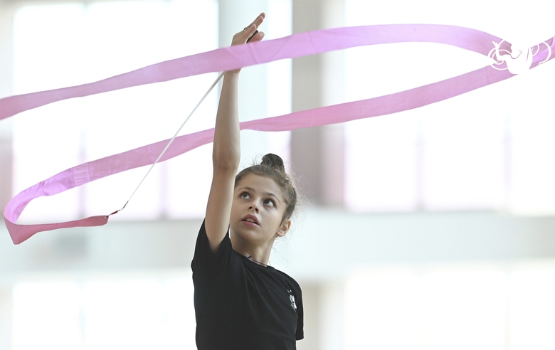 Karolina Tarasova during an exercise with a ribbon