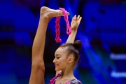 Gymnast during an exercise with a jump rope