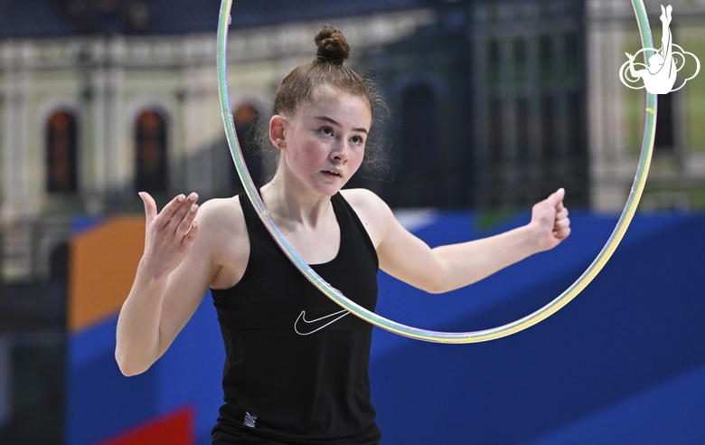 Gymnasts perform exercises with hoops during floor testing before the BRICS Games