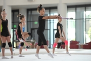 Gymnasts from Belgorod during an exercise with clubs