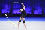 Ksenia Savinova during an exercise with a ribbon at floor testing