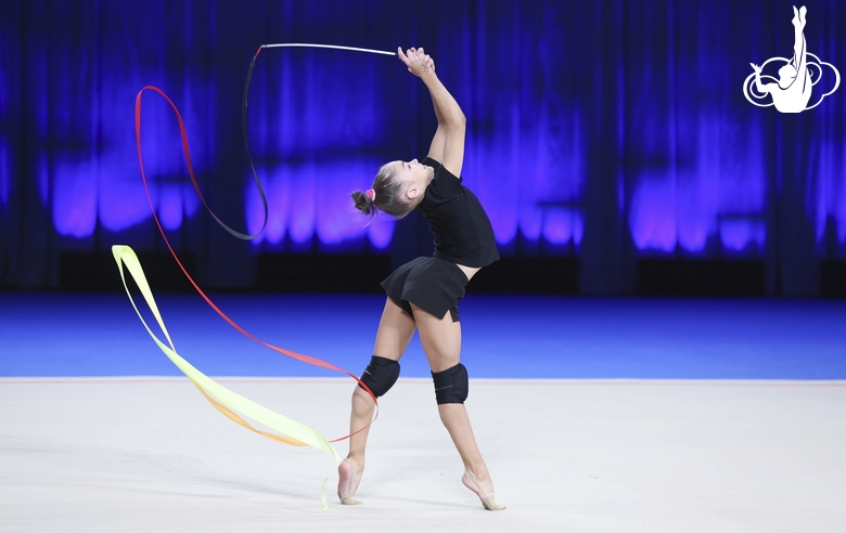 Ksenia Savinova during an exercise with a ribbon at floor testing