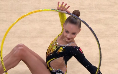 Выступление Ксении Бондаренко с обручем на соревнованиях в Пекине
