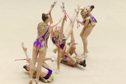 Gymnasts during an exercise with clubs