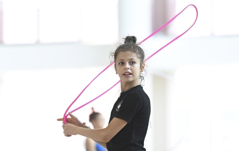 Karolina Tarasova during an exercise with a rope at a training session