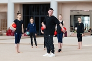 Kirill Barkan, the choreographer of the Russian national team, and the Academy junior group gymnasts