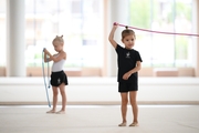 Young gymnasts during training