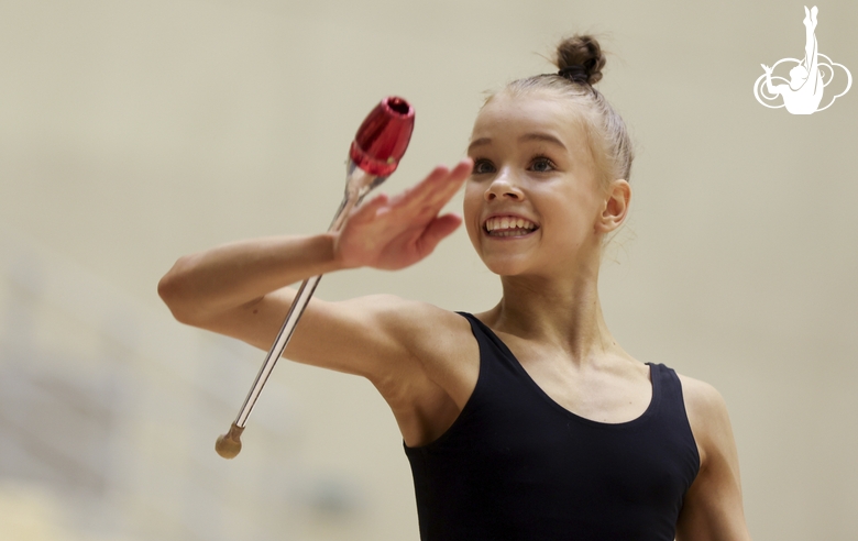 Kristina Voitenko during an exercise with clubs  at floor testing