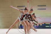 Gymnasts during an exercise with hoops