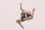 Gymnast does an exercise with a hoop during her performance at the All-Russian Formula of Victory competition