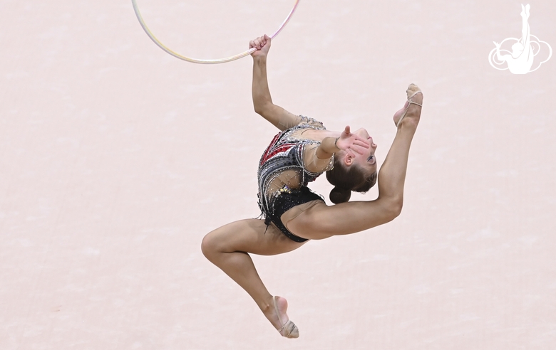 Gymnast does an exercise with a hoop during her performance at the All-Russian Formula of Victory competition