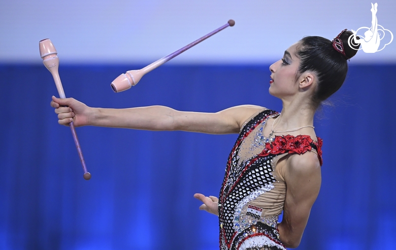 Maya Salum during an exercise with clubs