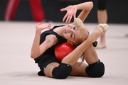 Ksenia Savinova  during an exercise with a ball during floor testing