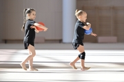 Young gymnasts during training