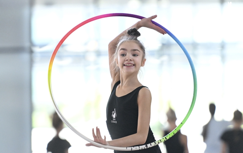 Ksenia Savinova during an exercise with a hoop during training at the Academy