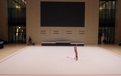 Alina Kabaeva works with Eva Kononova after completion of the assessment training session