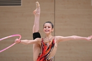 Karolina Tarasova during an exercise with a hoop at a control training session