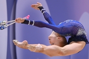 Olga Chernykh during an exercise with clubs at the control training session